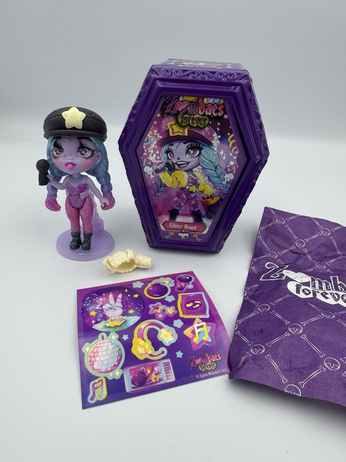Zombaes Forever Glitter Bomb Chase Figure w Coffin & Stickers