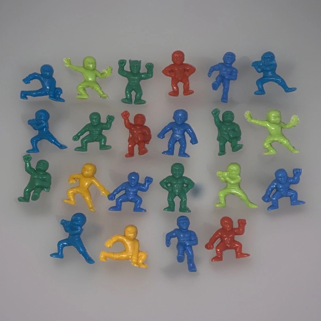 Vntg Vending Machine MUSCLE MEN 2” Toy Figure Lot 22 Blue Red Green Orange Blue