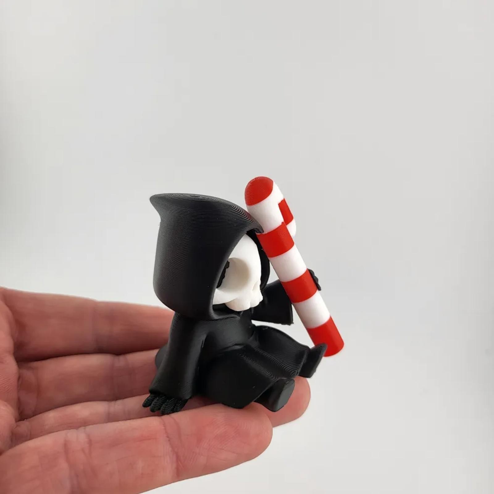 Sitting Grim Reaper with Candy Cane – Cute Goth Christmas Shelf Sitter