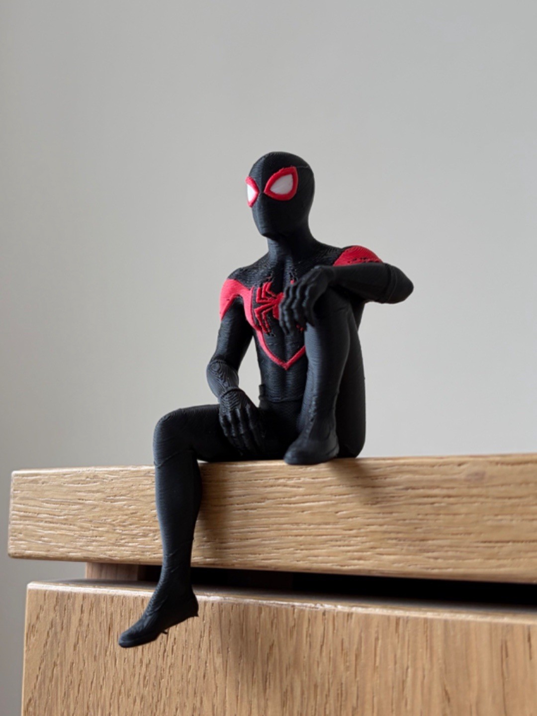 Miles Morales Sitting on Shelf Figure | Spider-Man