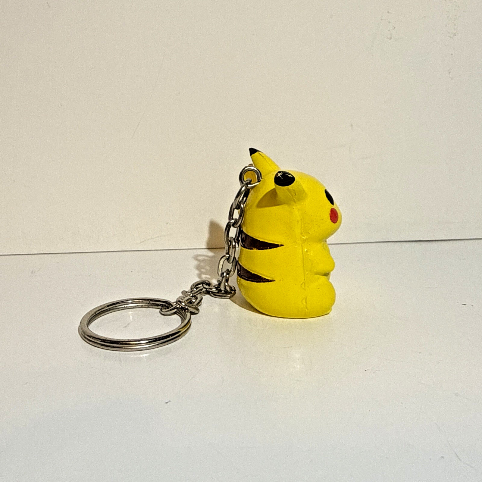 Pikachu (#025) 1999 Basic Fun BFI Pokémon Keychain Figure w/ Pokeball