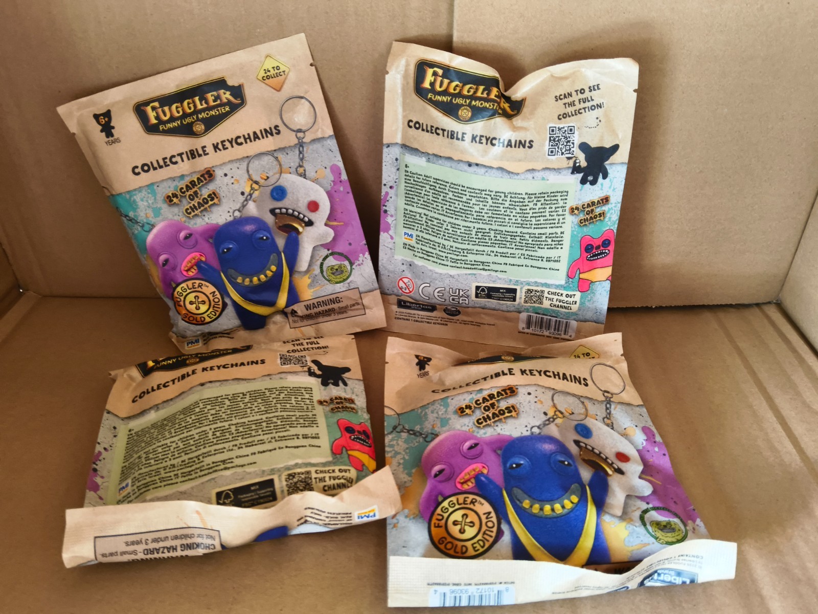 Case Of 24 Pieces Fuggler Funny Ugly Monster Collectible Keychains Gold Edition