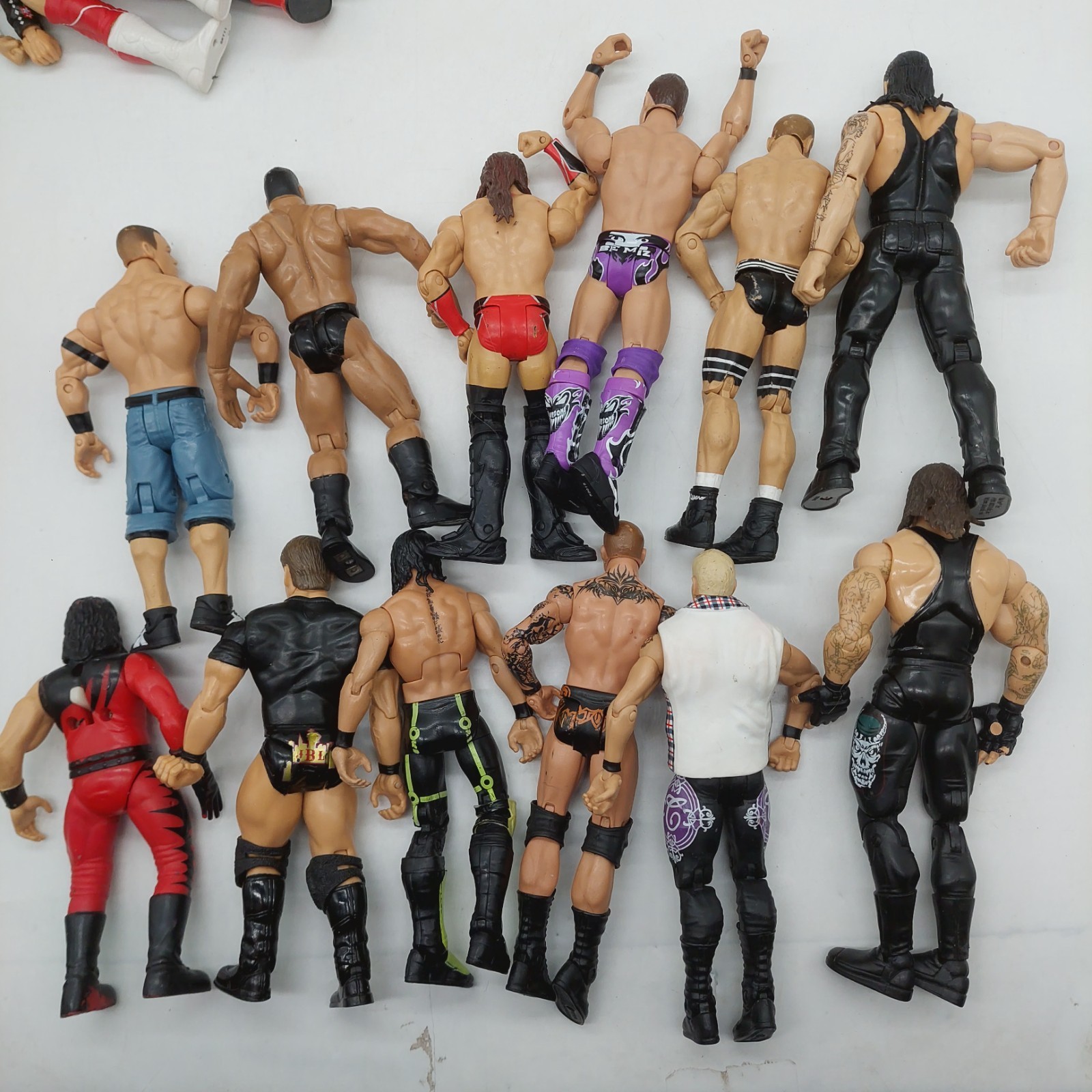 WWE Action Figures lot of 12 Figures Various Years Brands Sizes Read