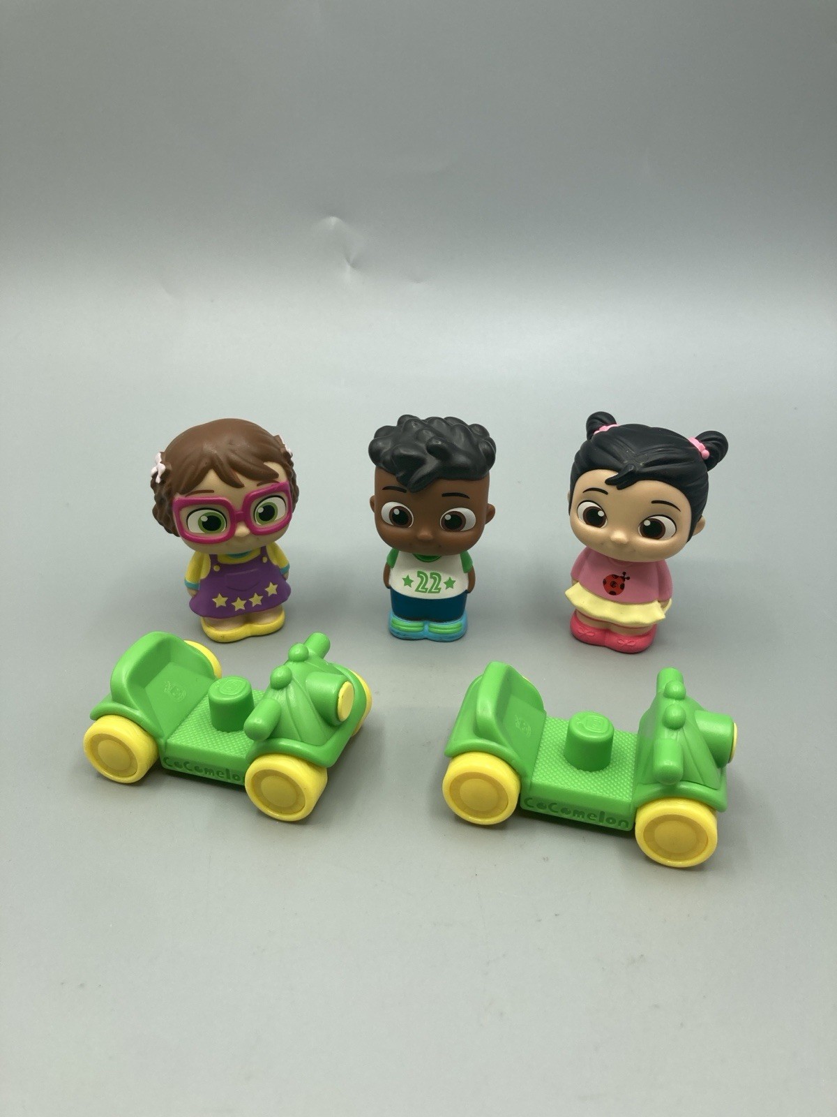 CoComelon Lot 3 Figures, 2 Play Cars 2.5” Standing Figures (little People Style)