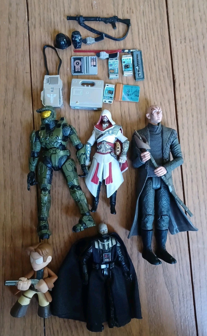 Collection Of Actiom Figurines From Star Trek/Wars And Others Themes.