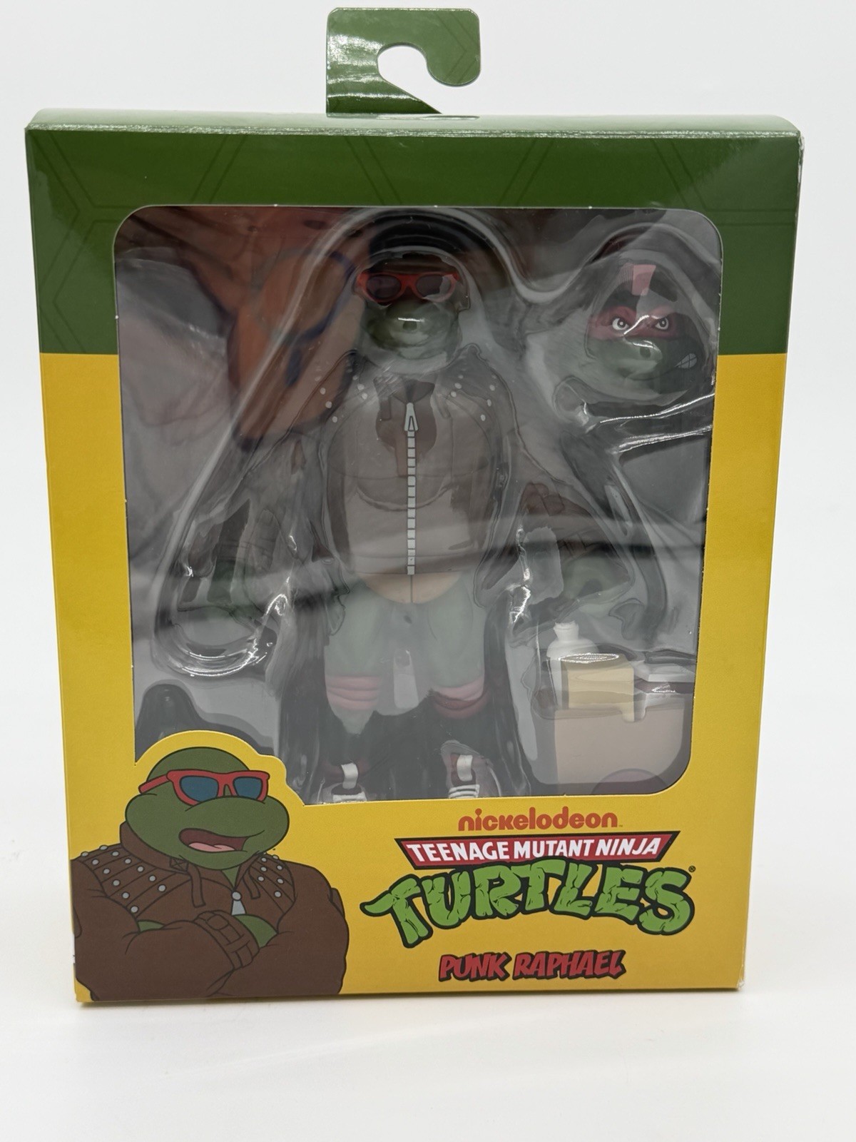 NECA TMNT Punk Raphael Action Figure, Green/Brown/Red w/ Heads Hands Bag