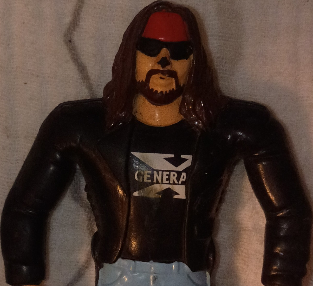 Action Figure Toy – Long Brown Hair, Black Jacket, Blue Jeans Pants