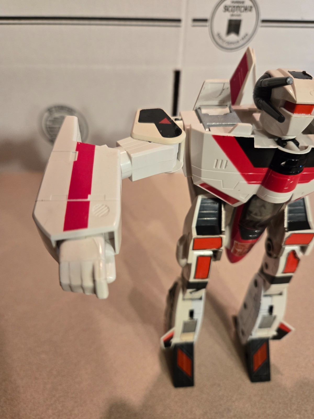 Vintage 1985 Transformers G1 Jetfire figure with accessory pieces.