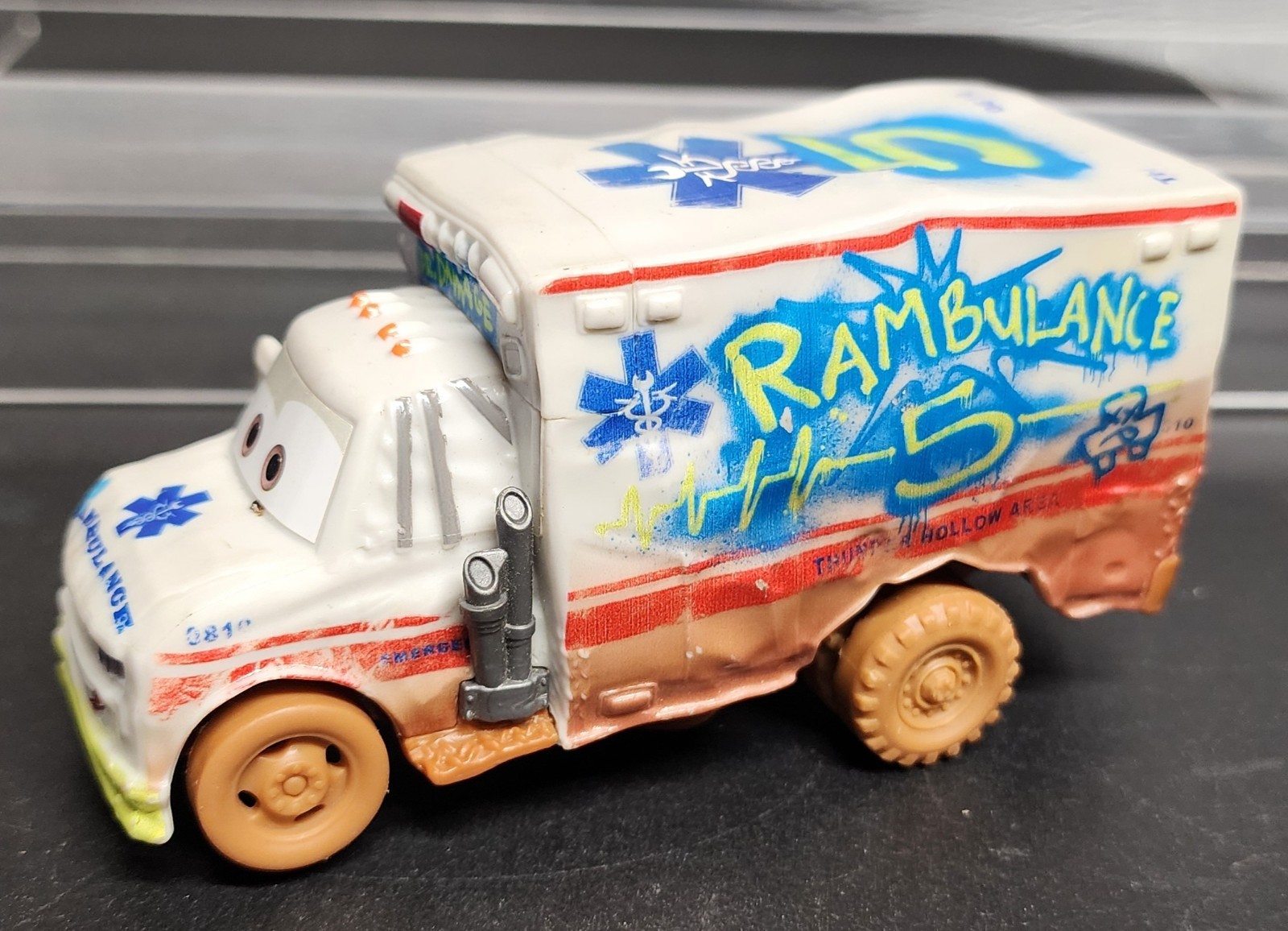 Disney Pixar Cars 3 Crazy 8 Crashers Dr. Damage Rambulance #5 Muddy Tires