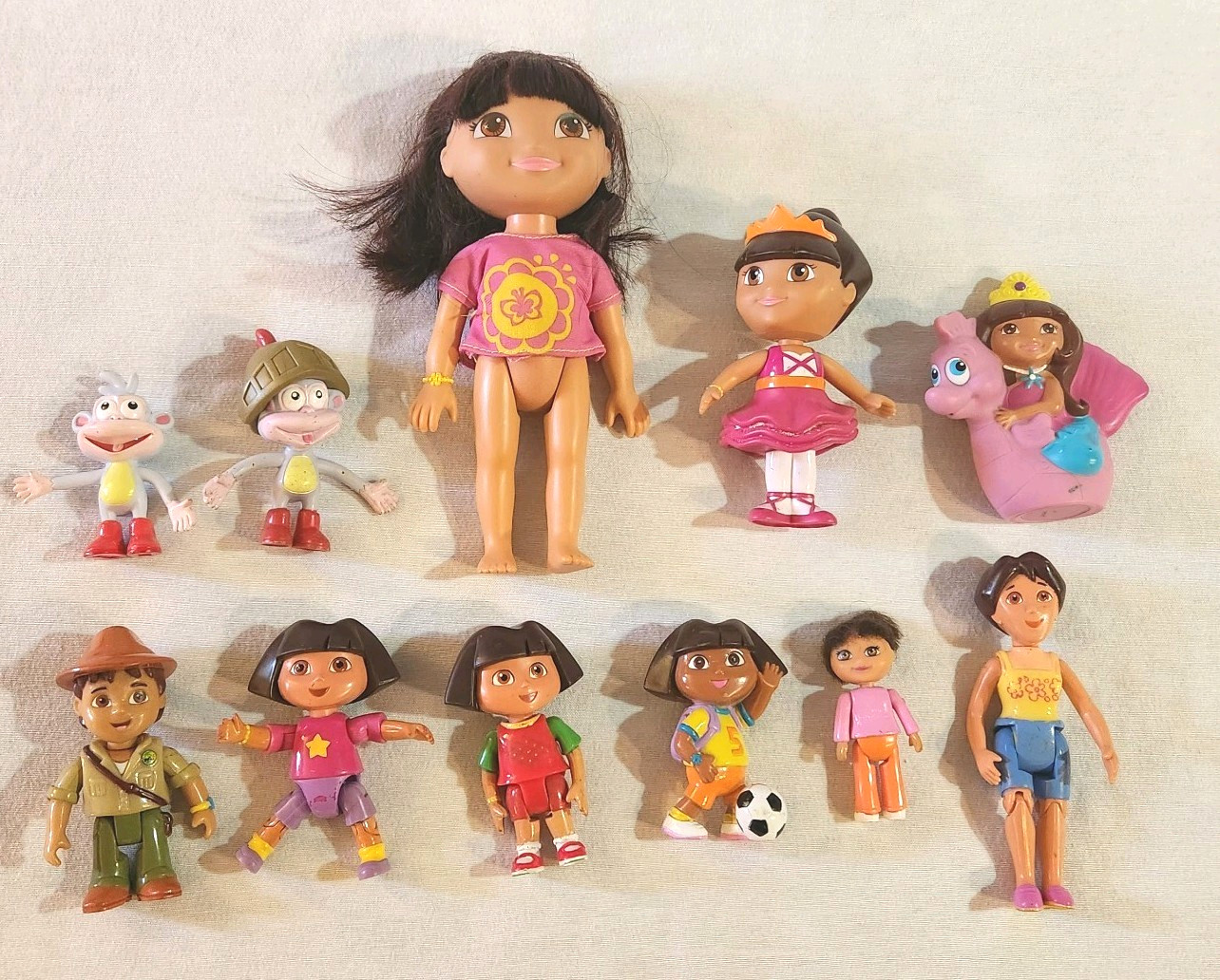 Dora The Explorer Lot Of 11 Figures. – Dora, Boots, Diego, And Mami Mom