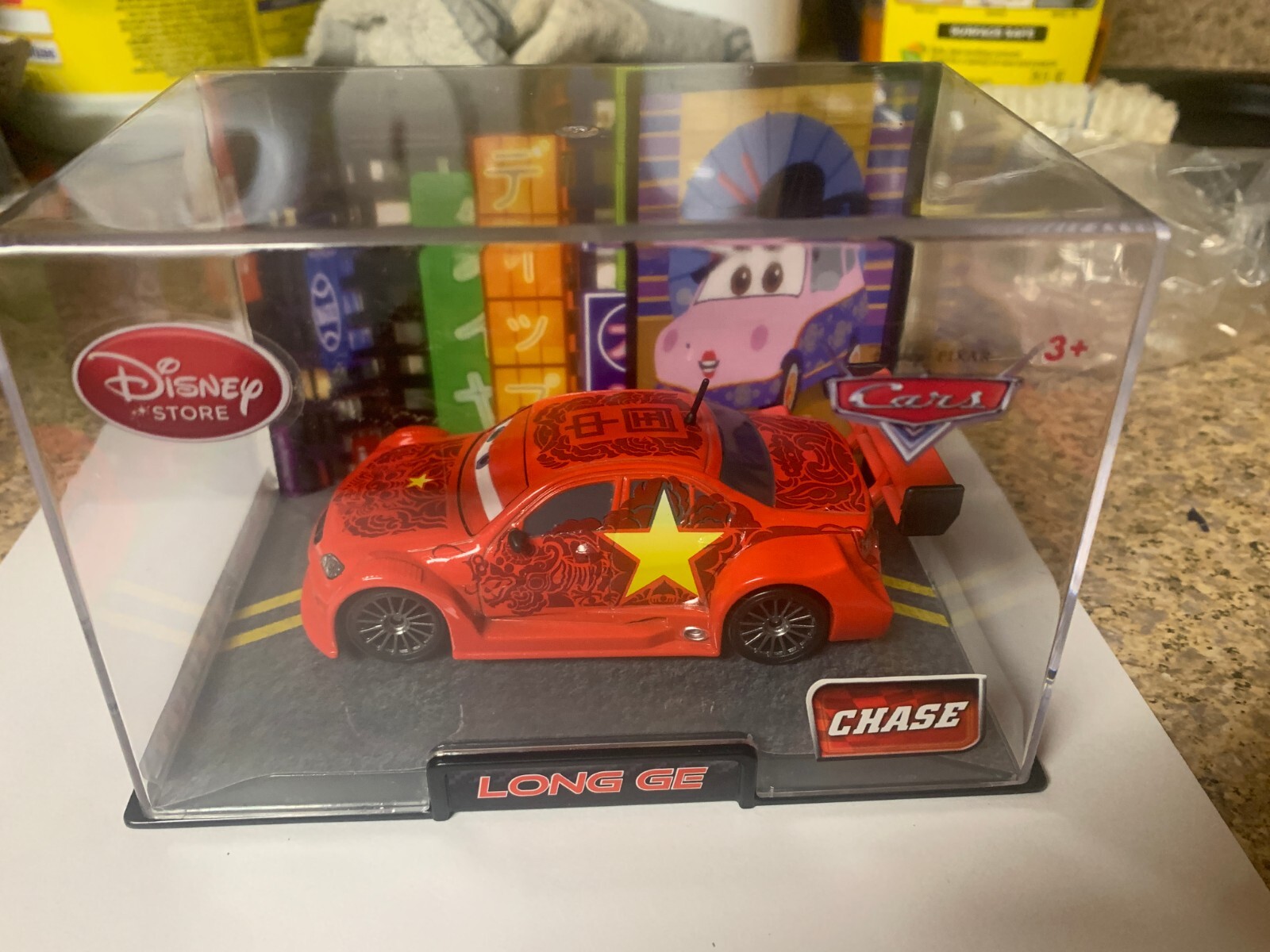 Disney Store Long Ge Chase! In an acrylic display case, 1:43 scale die-cast!