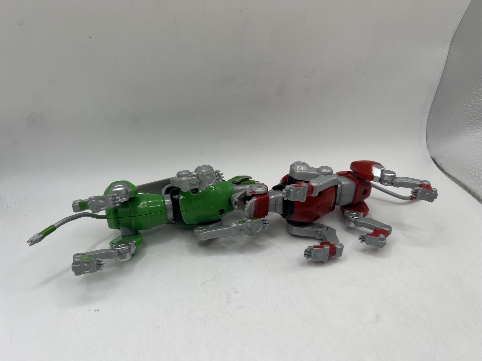 Two 2017 Voltron Legendary Defender Lion toys Green and Red