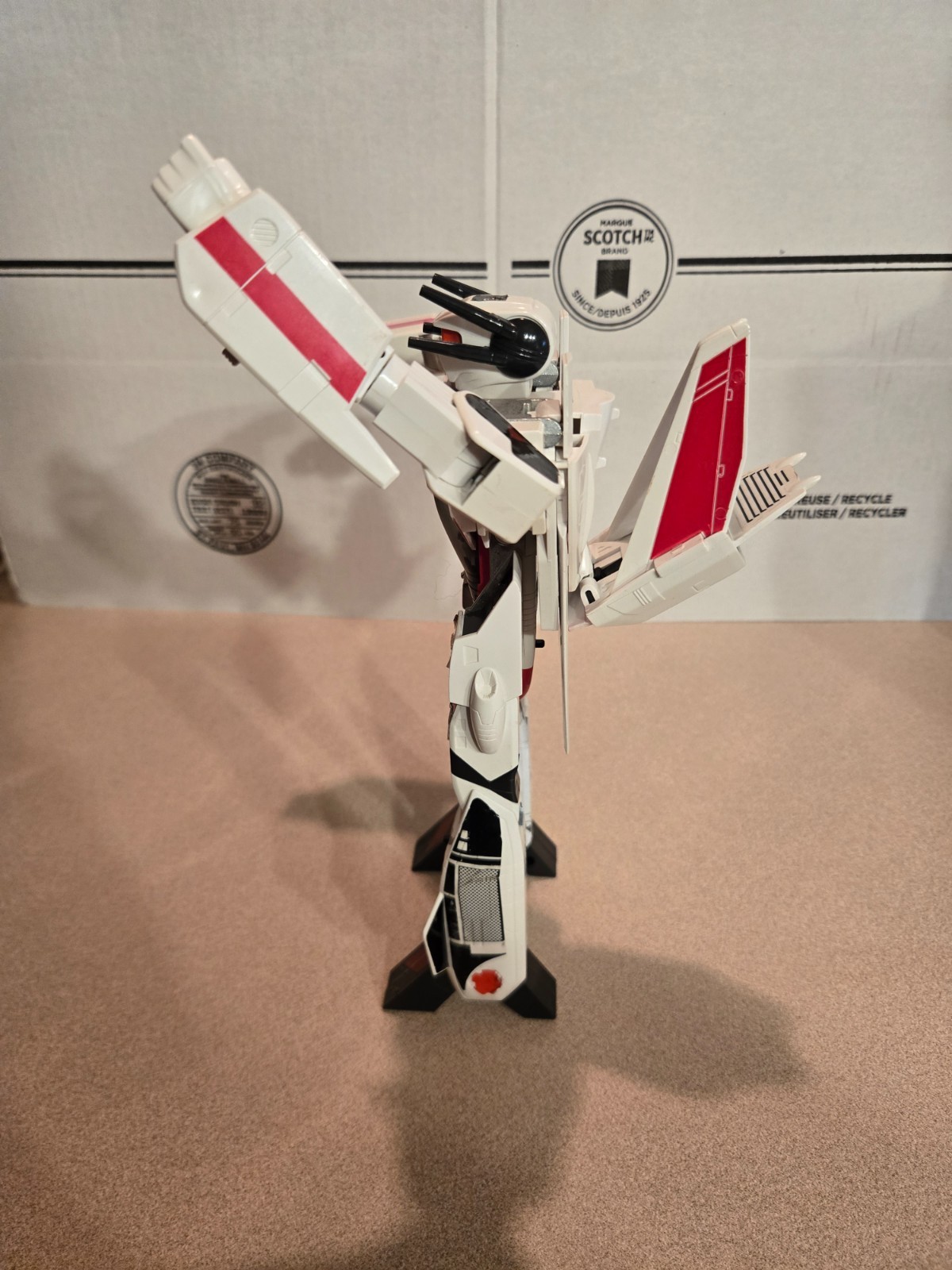 Vintage 1985 Transformers G1 Jetfire figure with accessory pieces.
