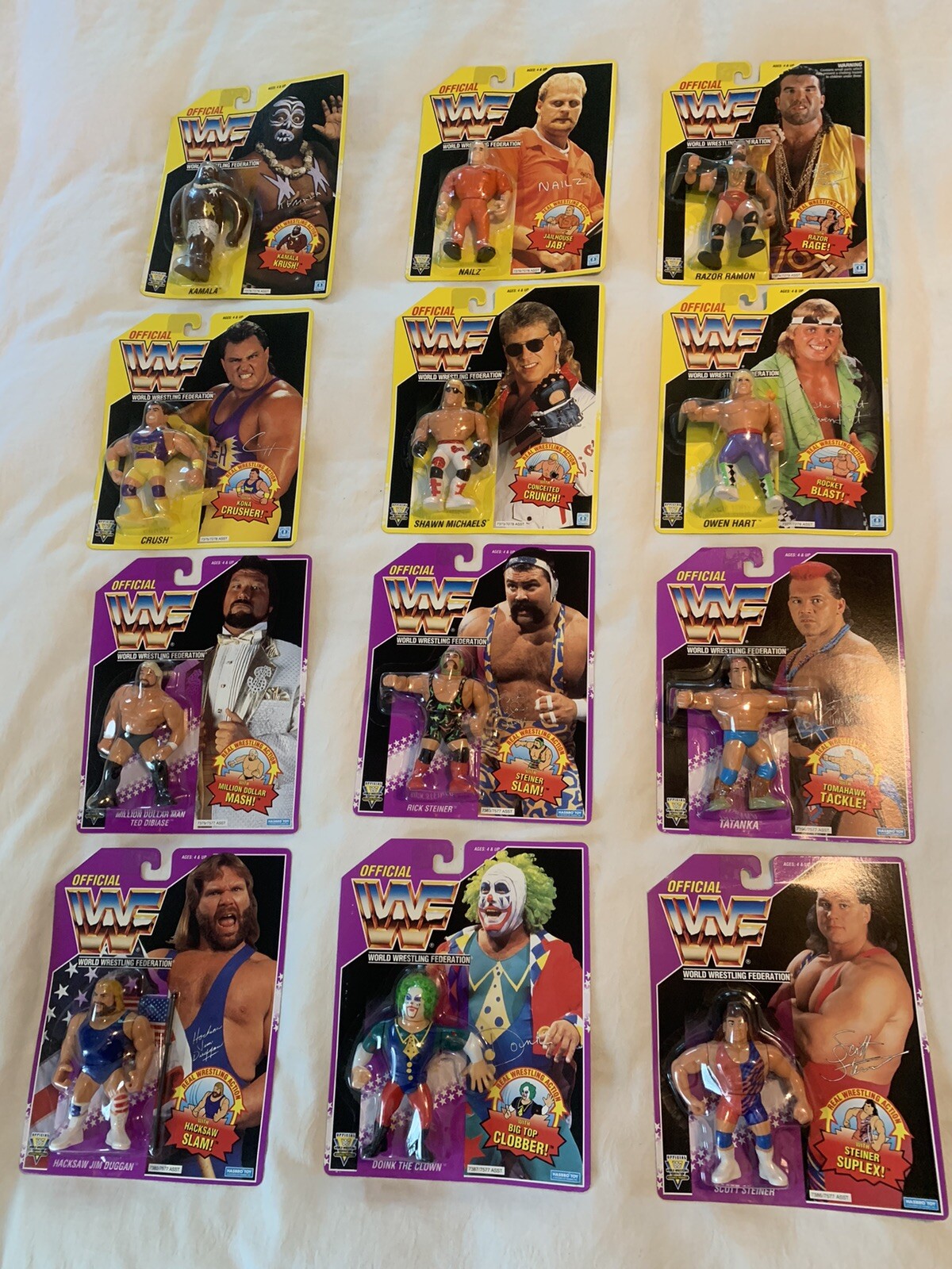 WWF HASBRO LOT OF 12 MOC NOT GRADED FROM FACTORY SHIPPING BOX.