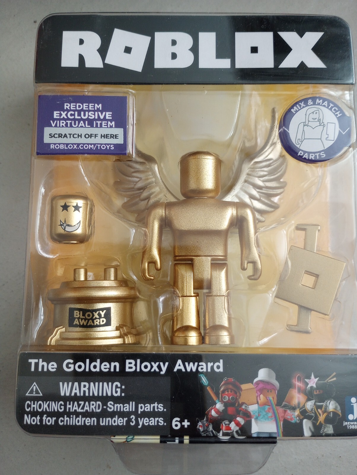 The Golden Bloxy Award with virtual code.