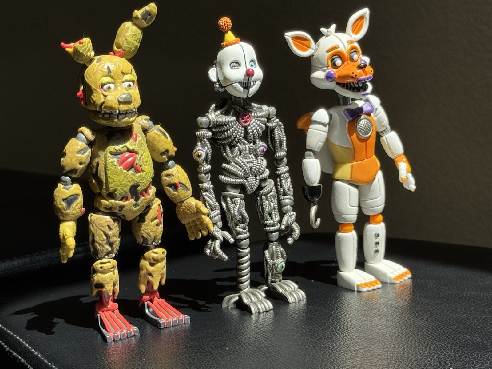 Funko 2016 & 2017 Three 5’ inch Figure Set: Springrap, Ennard, and Lolbit.