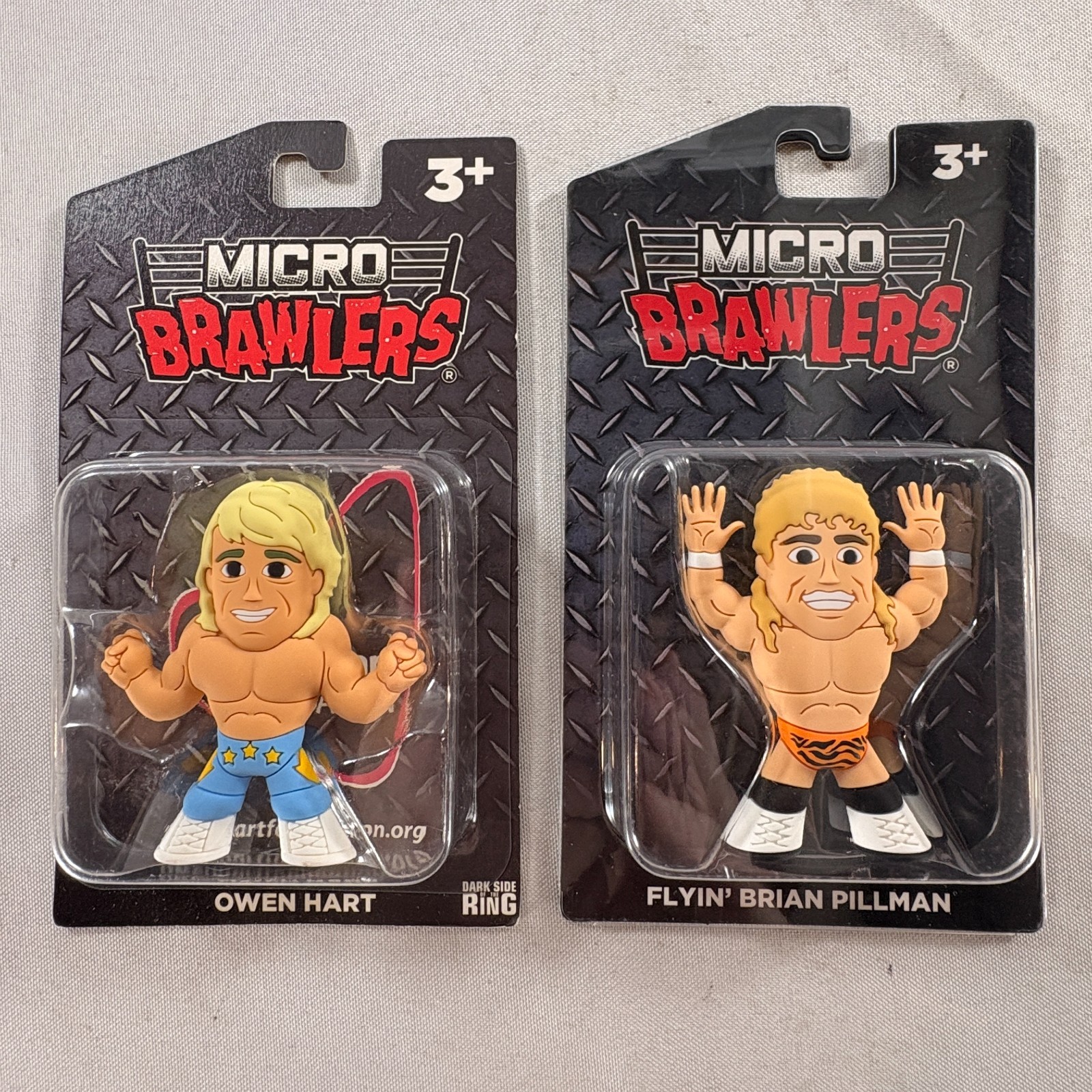 Lot of 2 New/Sealed Micro Brawler Figures: Owen Hart & Flyin&rsquo; Brian Pillman wcw
