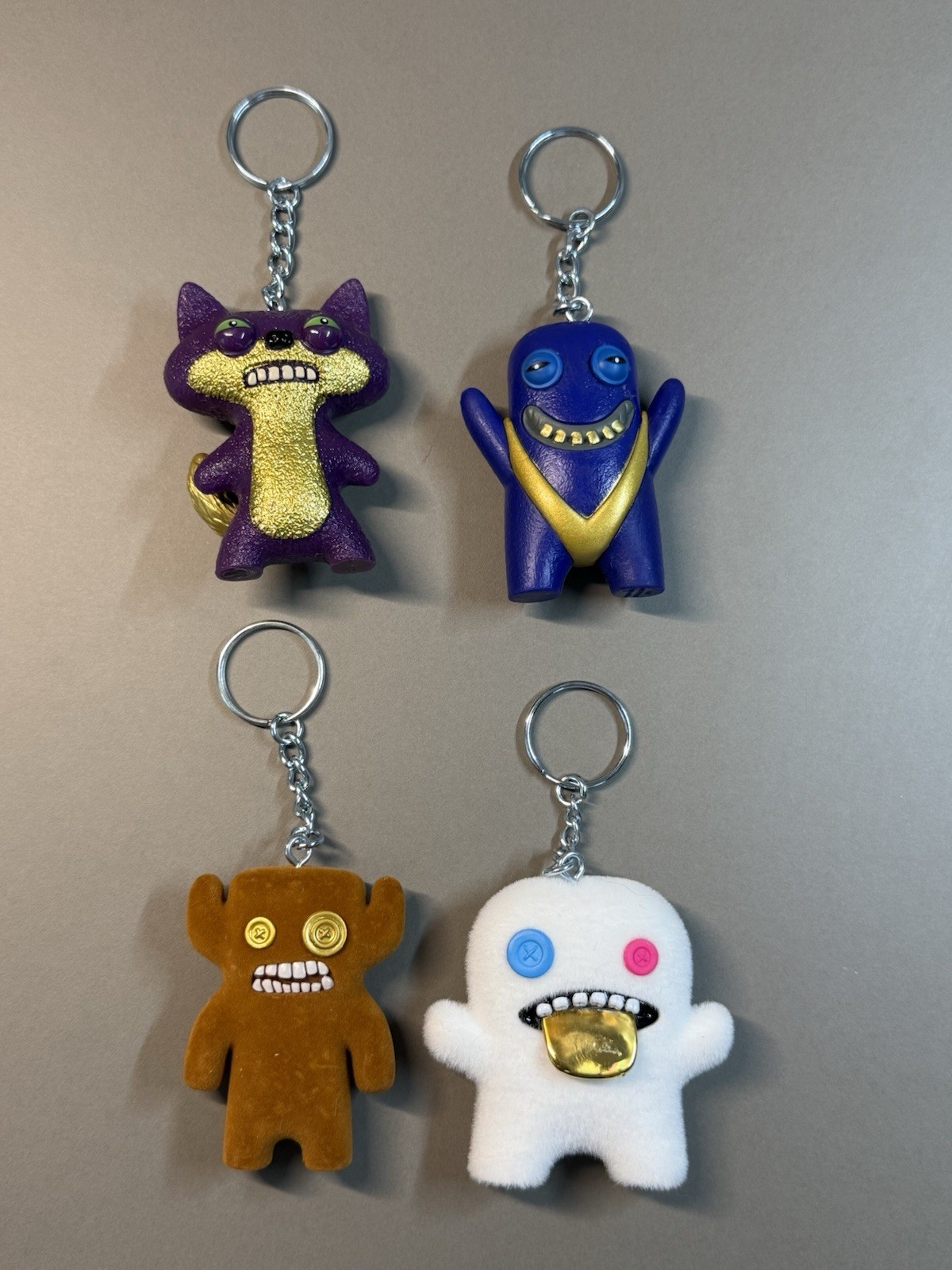 Fuggler Gold Series Bag Clip Keychain Rare Flocked Ooga Booga Lot Of 4