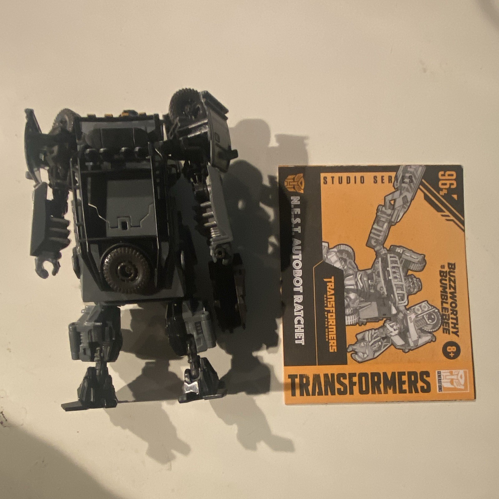 Transformers Studio Series 96 N.E.S.T. Autobot Ratchet Transforming w/ Gun 8+