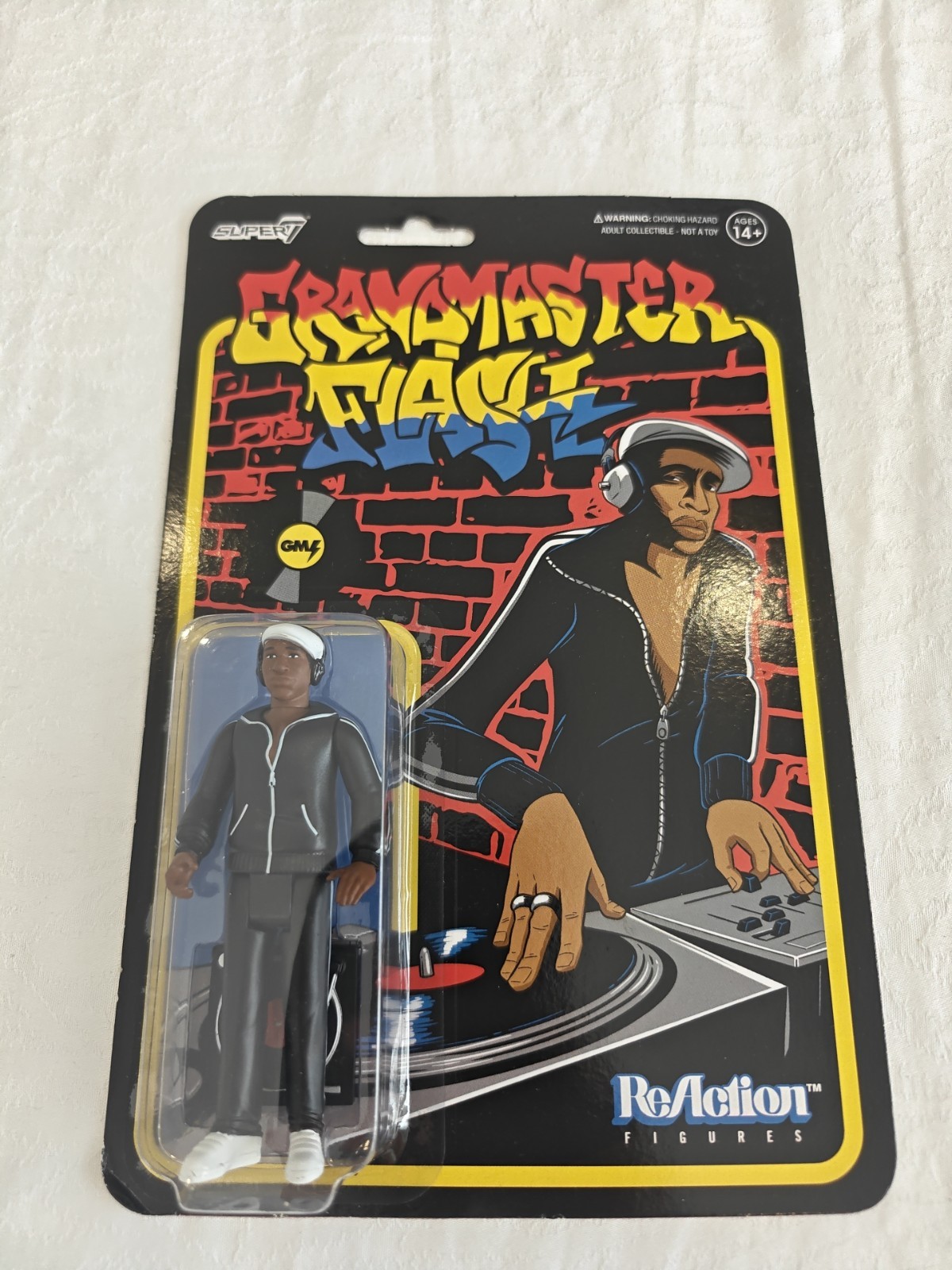 Grandmaster Flash Collectible 4&Prime; ReAction Figure with Accessory Black Age 14+