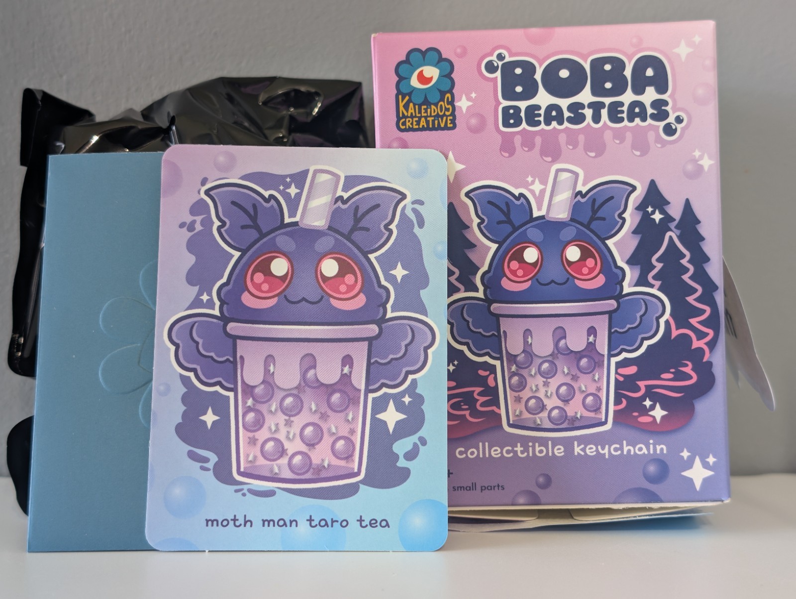 MOTH MAN Taro Tea Kaleidos Creative Boba Beasteas Liquid Filled W/Glitter OPENED